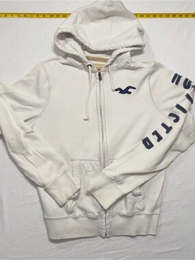 Y2K Hollister White Zip-Up Hoodie with Navy Logo and Sleeve Letters 2000s
